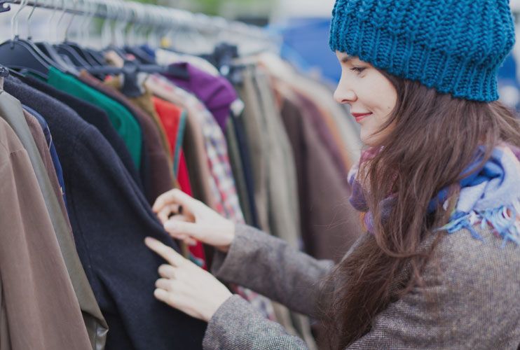 Woman going through clothes
